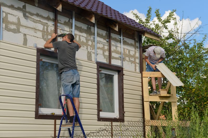 Vinyl siding being installed